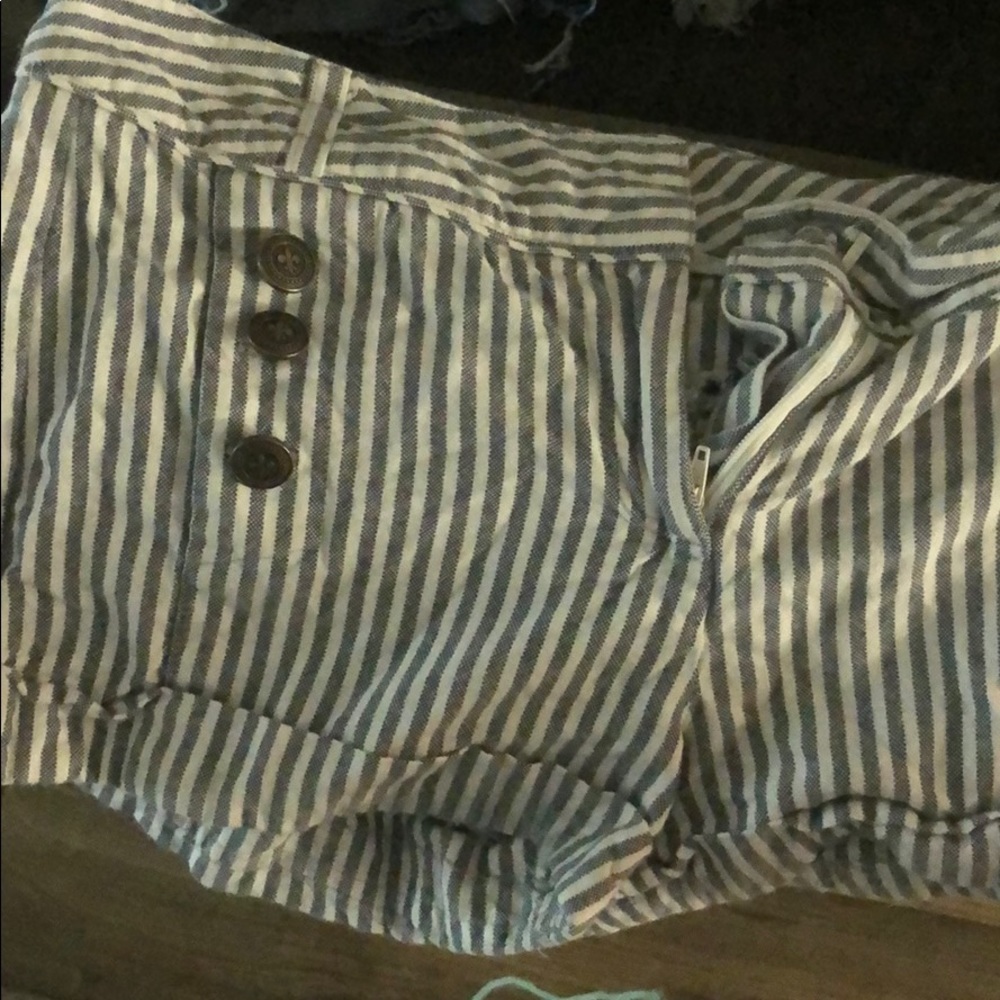 white shorts with blue stripes